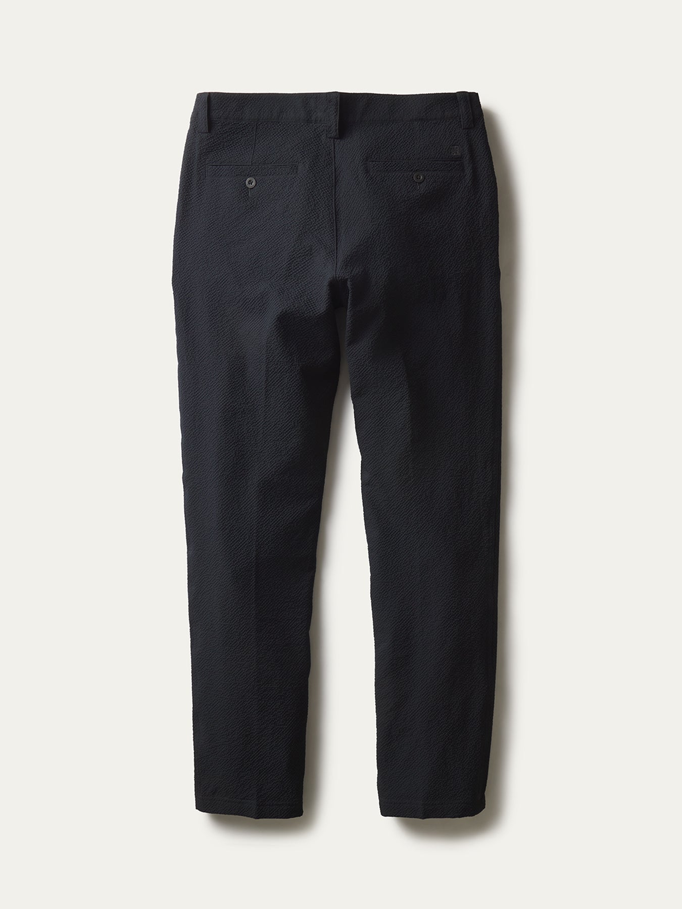 Rear view of the clean waistband and pockets
