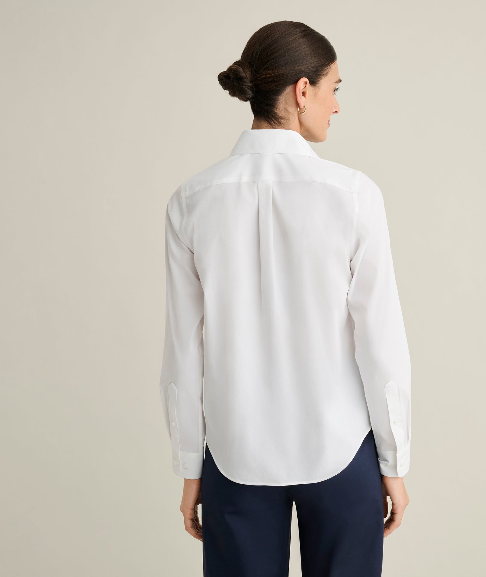 Side view showing the hip-length cut