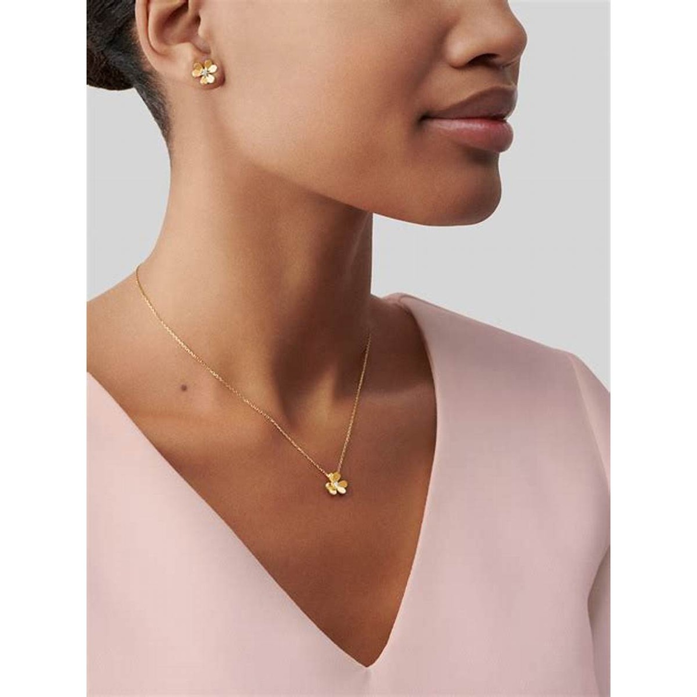 worn at the collarbone