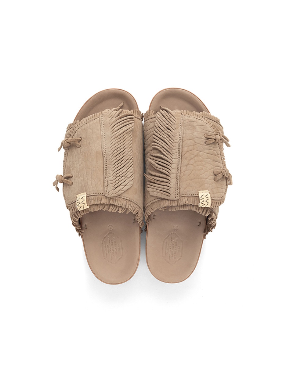 Side profile showing the layered leather upper