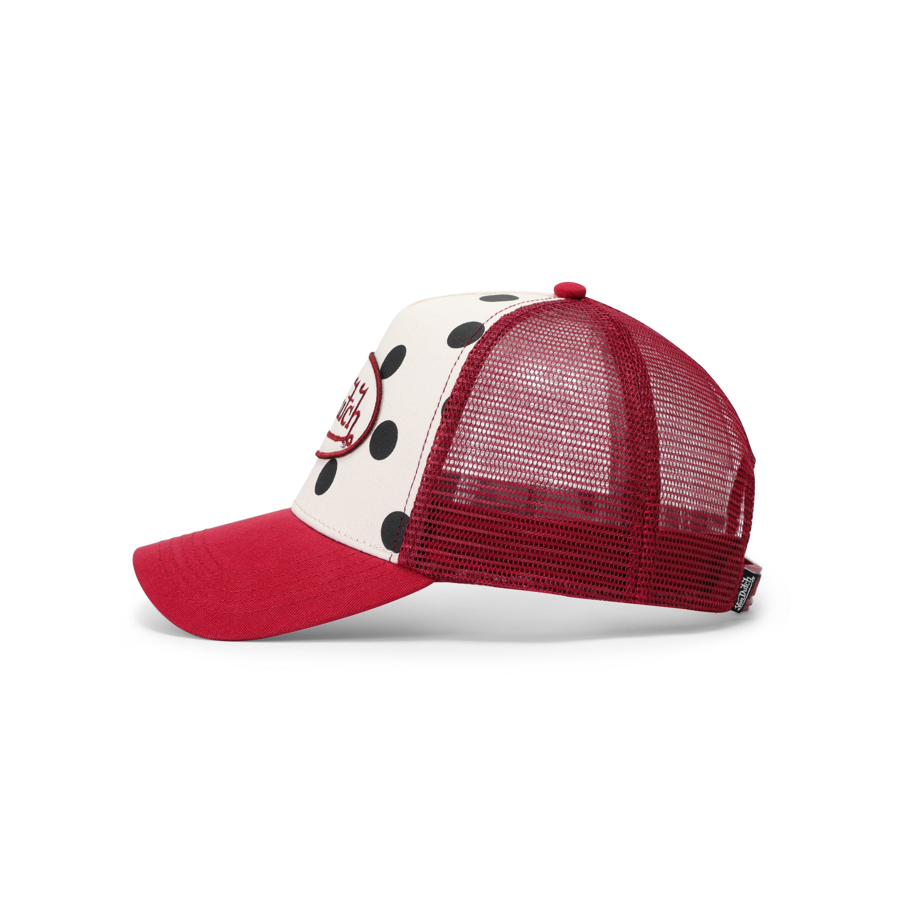 side view of the cream crown and red bill