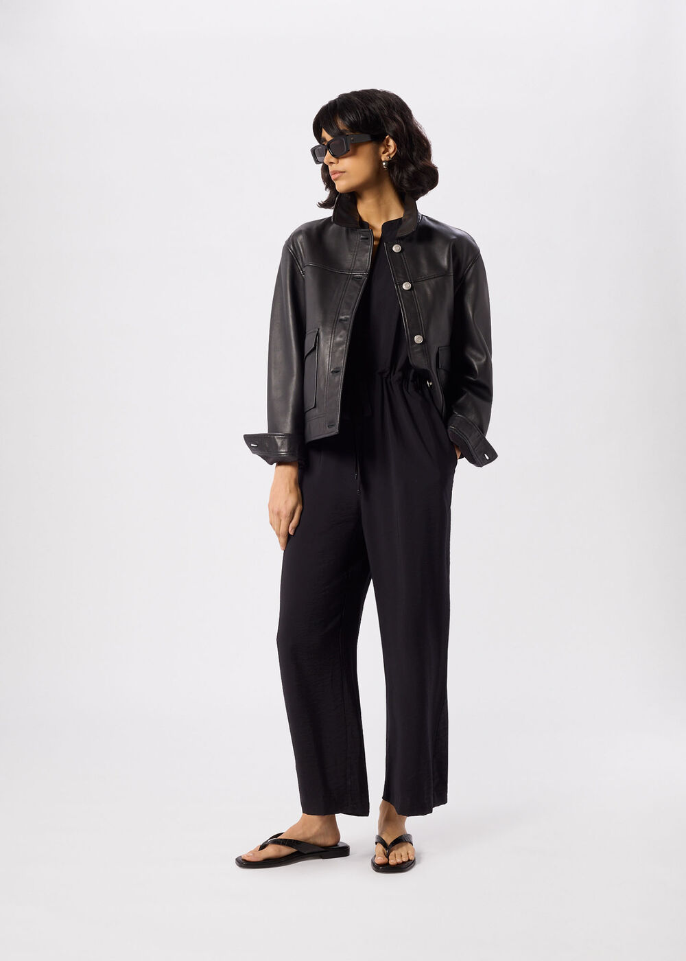 Sleeveless Drawstring Jumpsuit — side or back view