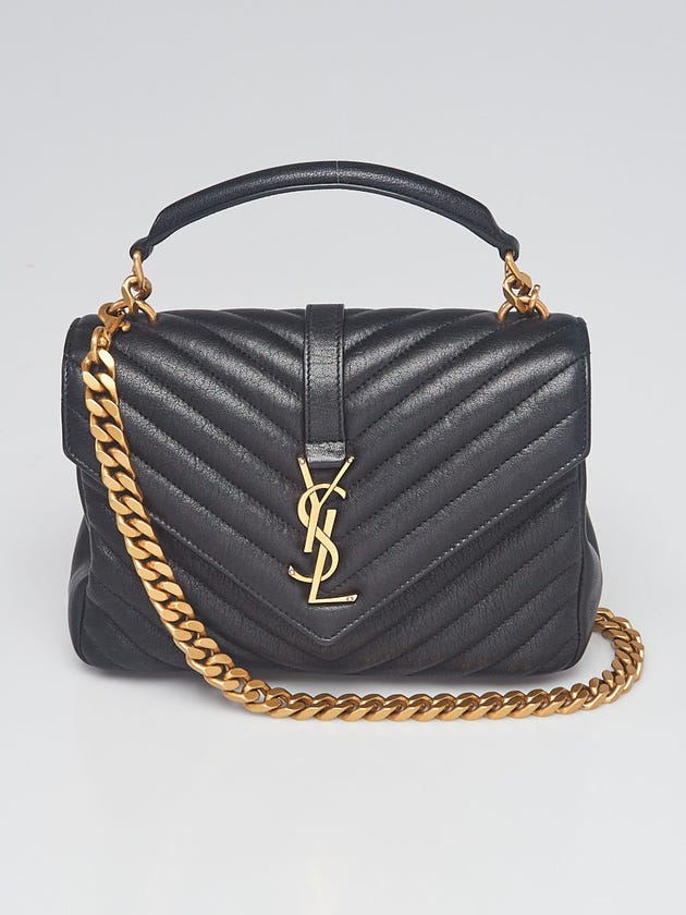 Gold chain-and-leather strap against the quilted envelope flap