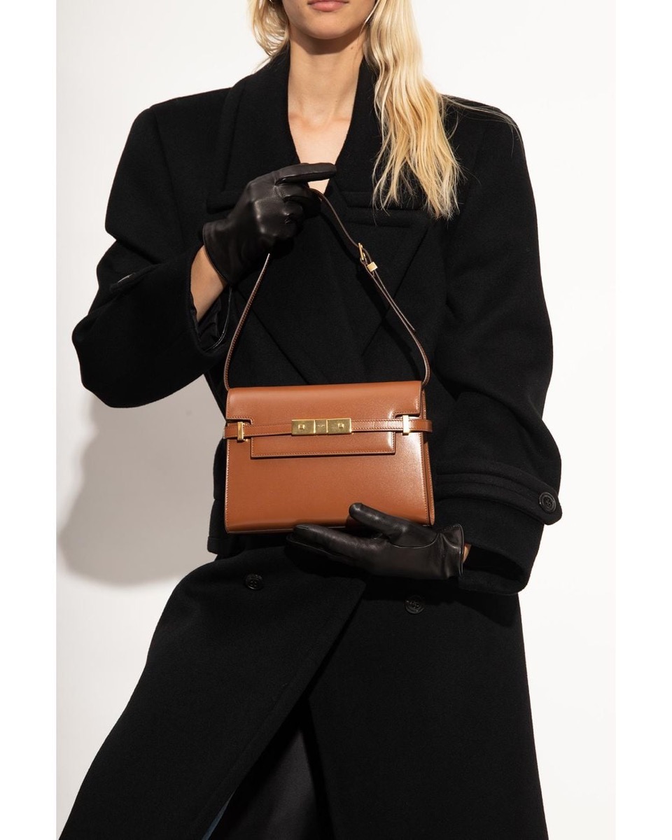 Tan box leather showing the belt strap across the front
