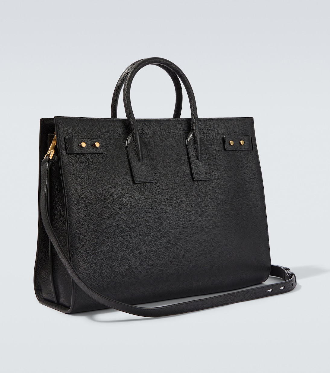 Large in grained calfskin — three-quarter angle showing the accordion side
