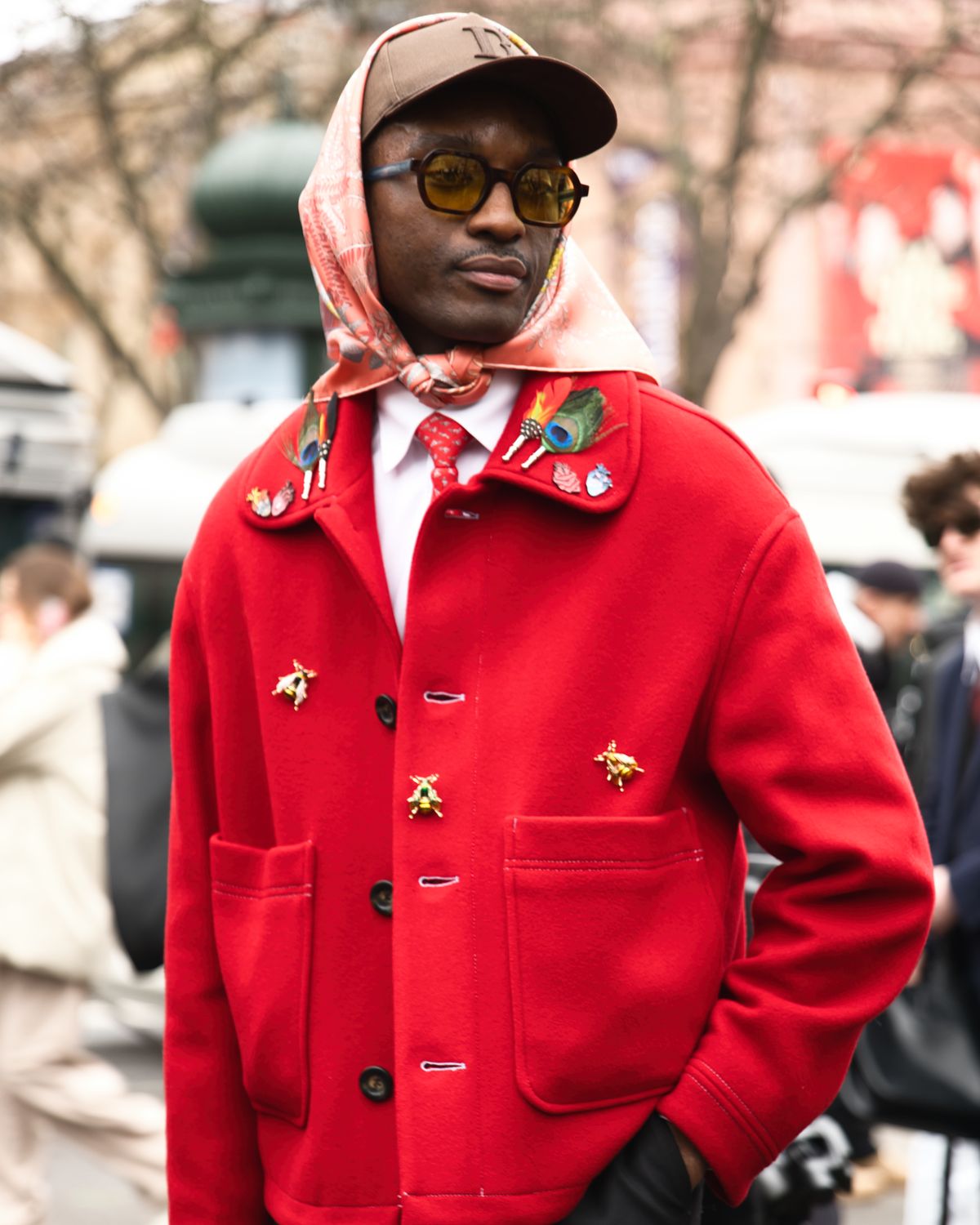 Street-style look in a bold red coat