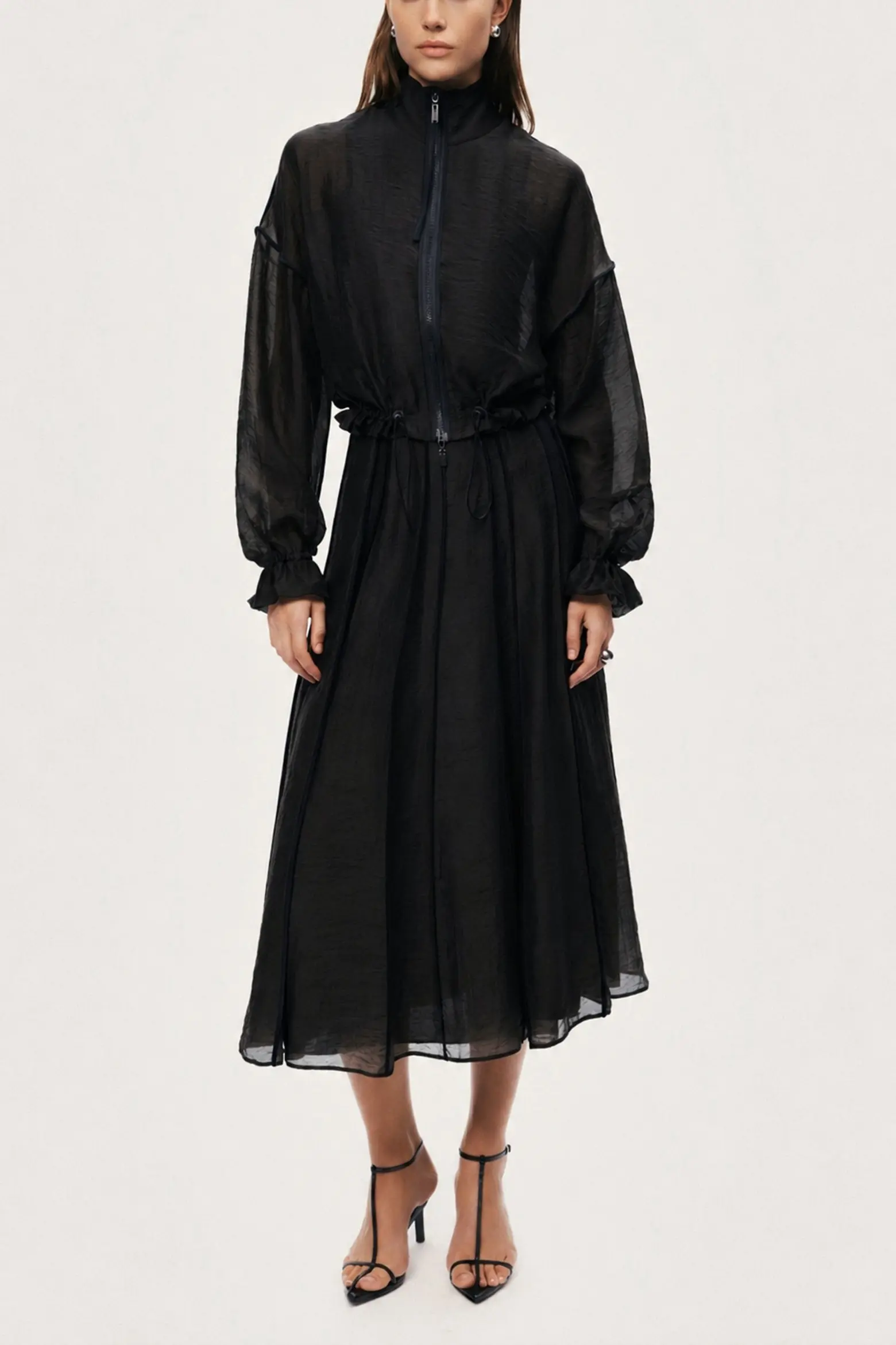 Nocturne black sheer pleated midi skirt shown from the front