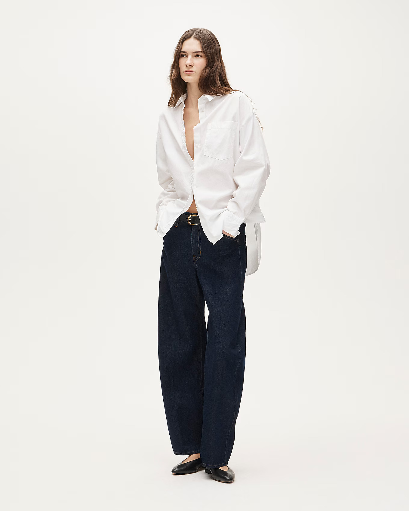 J.Crew Étienne oversized white oxford shirt styled untucked with dark jeans