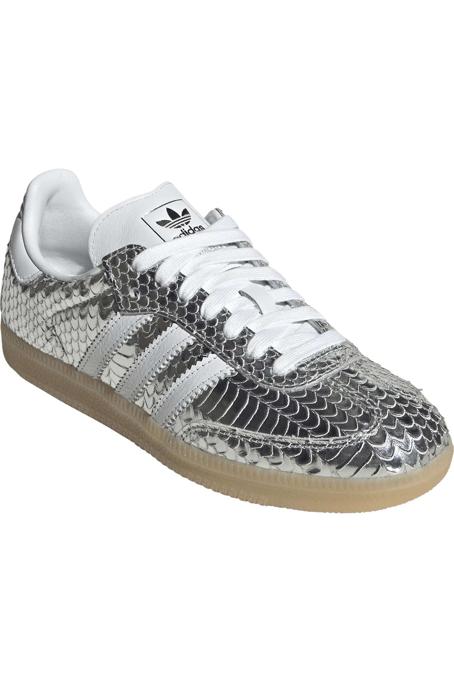 Silver metallic Adidas Samba OG sneaker shown completely on white