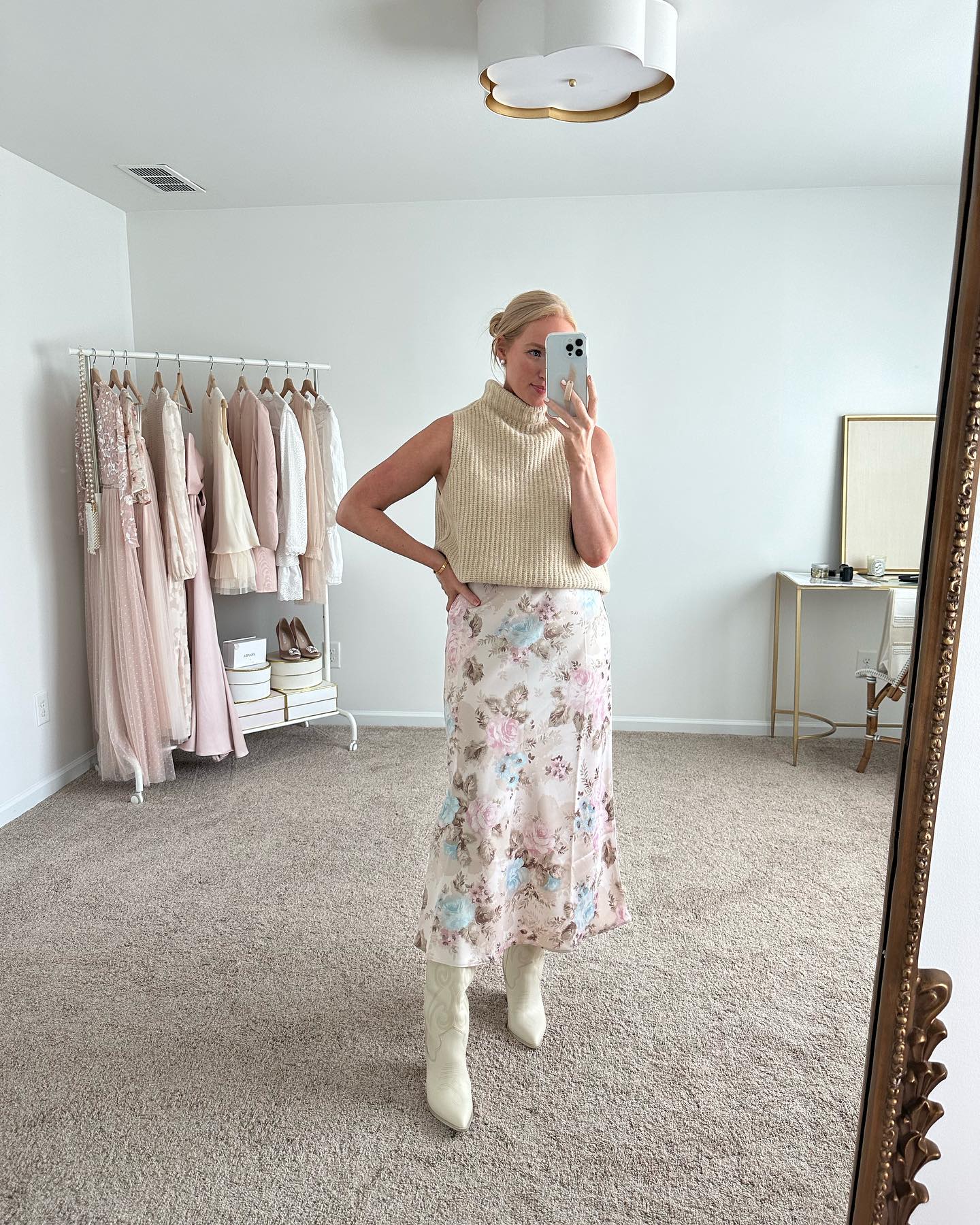 Personal Nordstrom Anniversary Sale haul outfit with a cream sleeveless knit, floral midi skirt, and white boots