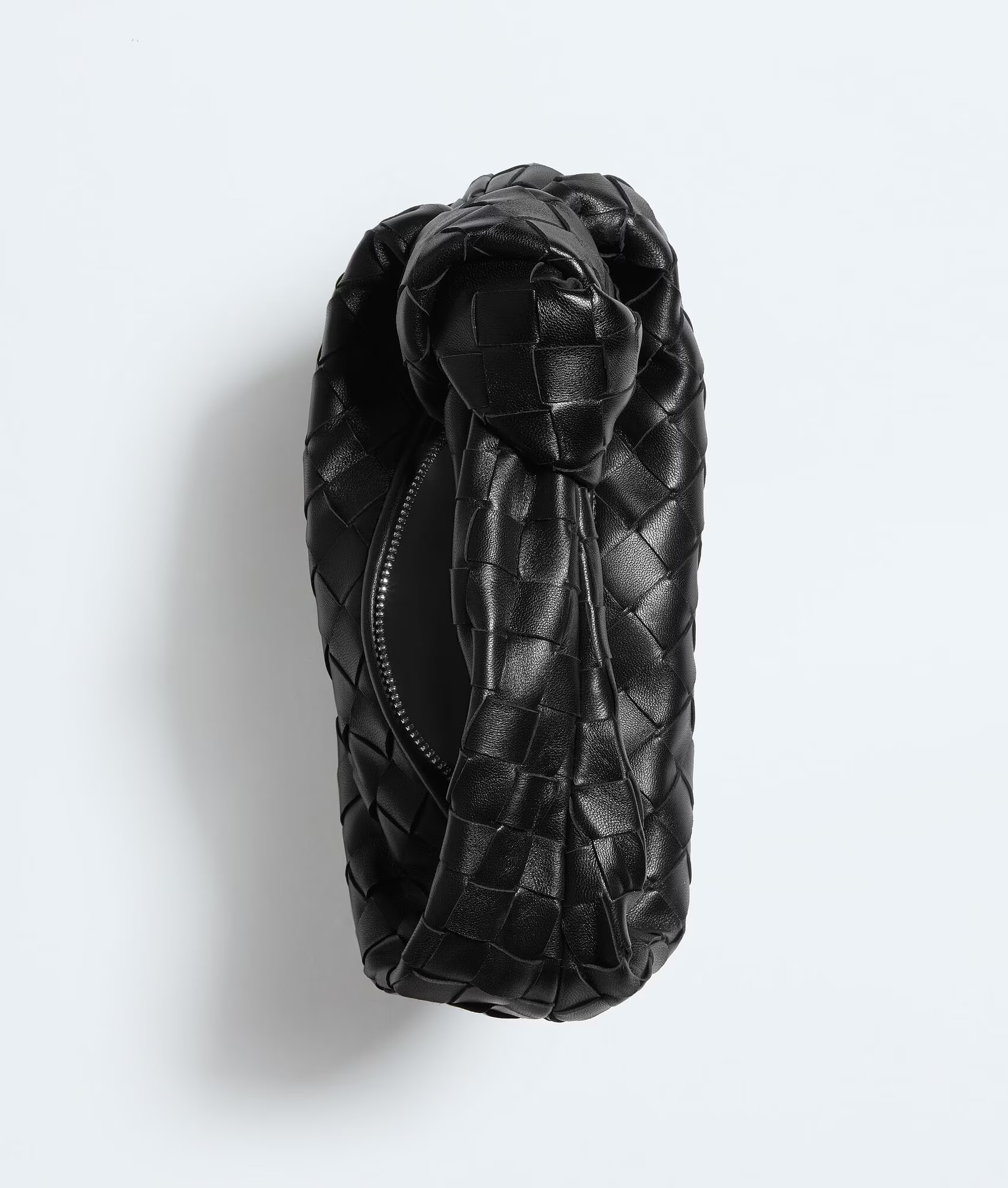 Bottega Veneta Mini Jodie black side detail showing woven leather texture