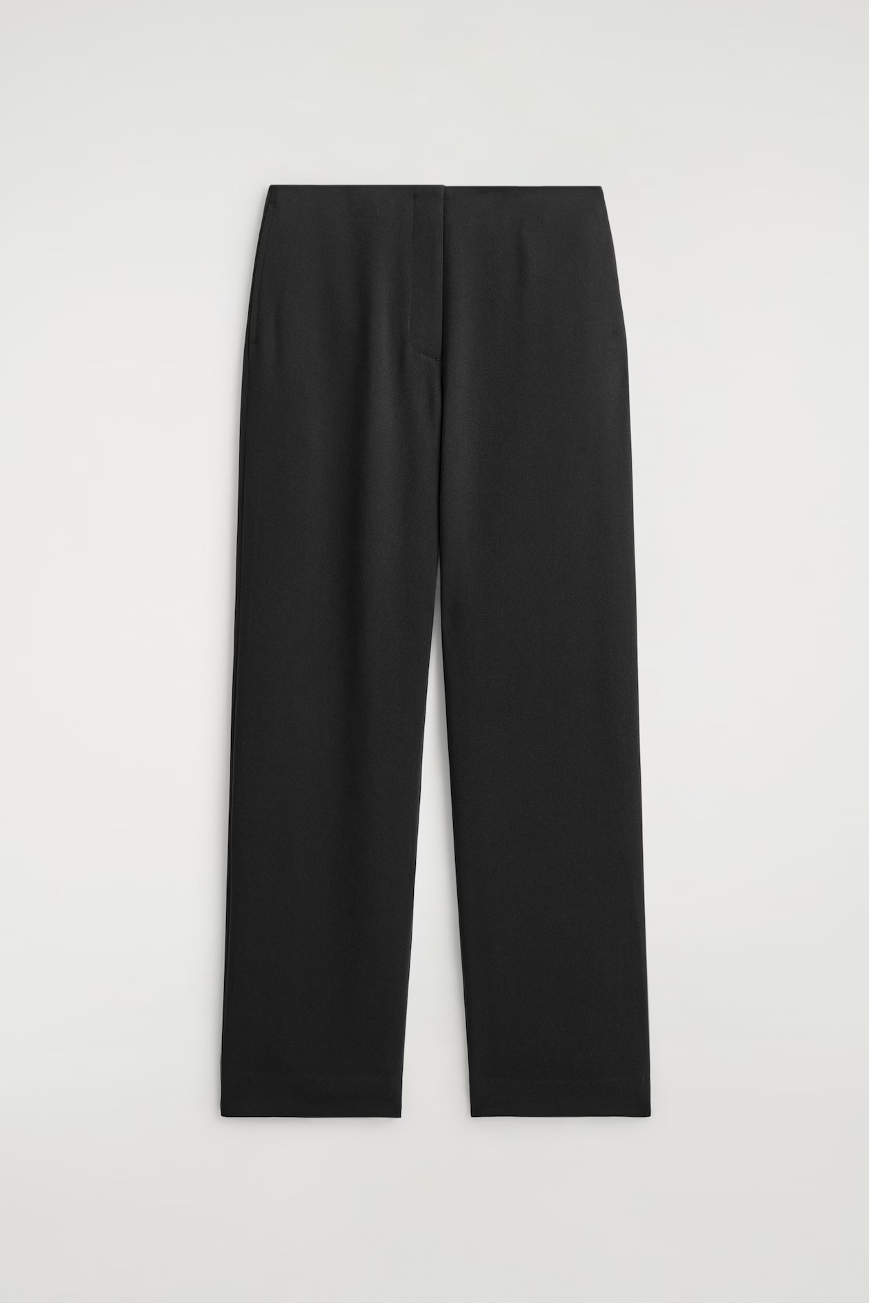 COS black tailored straight-leg trousers shown flat with their waistband, front pleats, and full hems visible