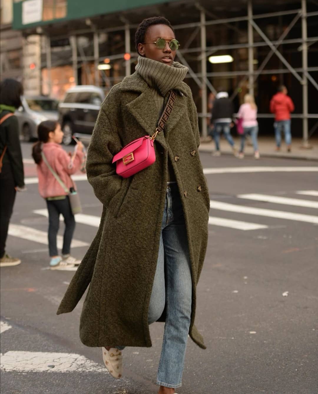 Street style outfit with a Ganni boucle oversized coat in New York