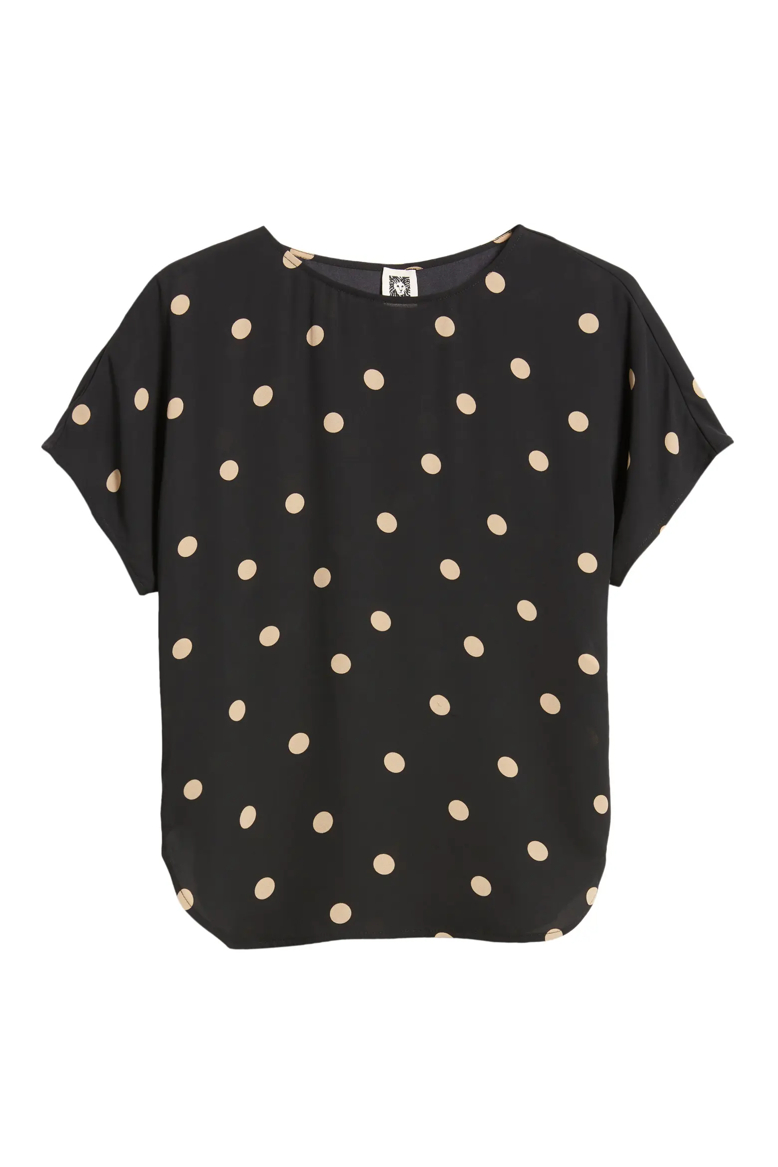 Anne Klein black short-sleeve blouse with widely spaced beige polka dots shown flat