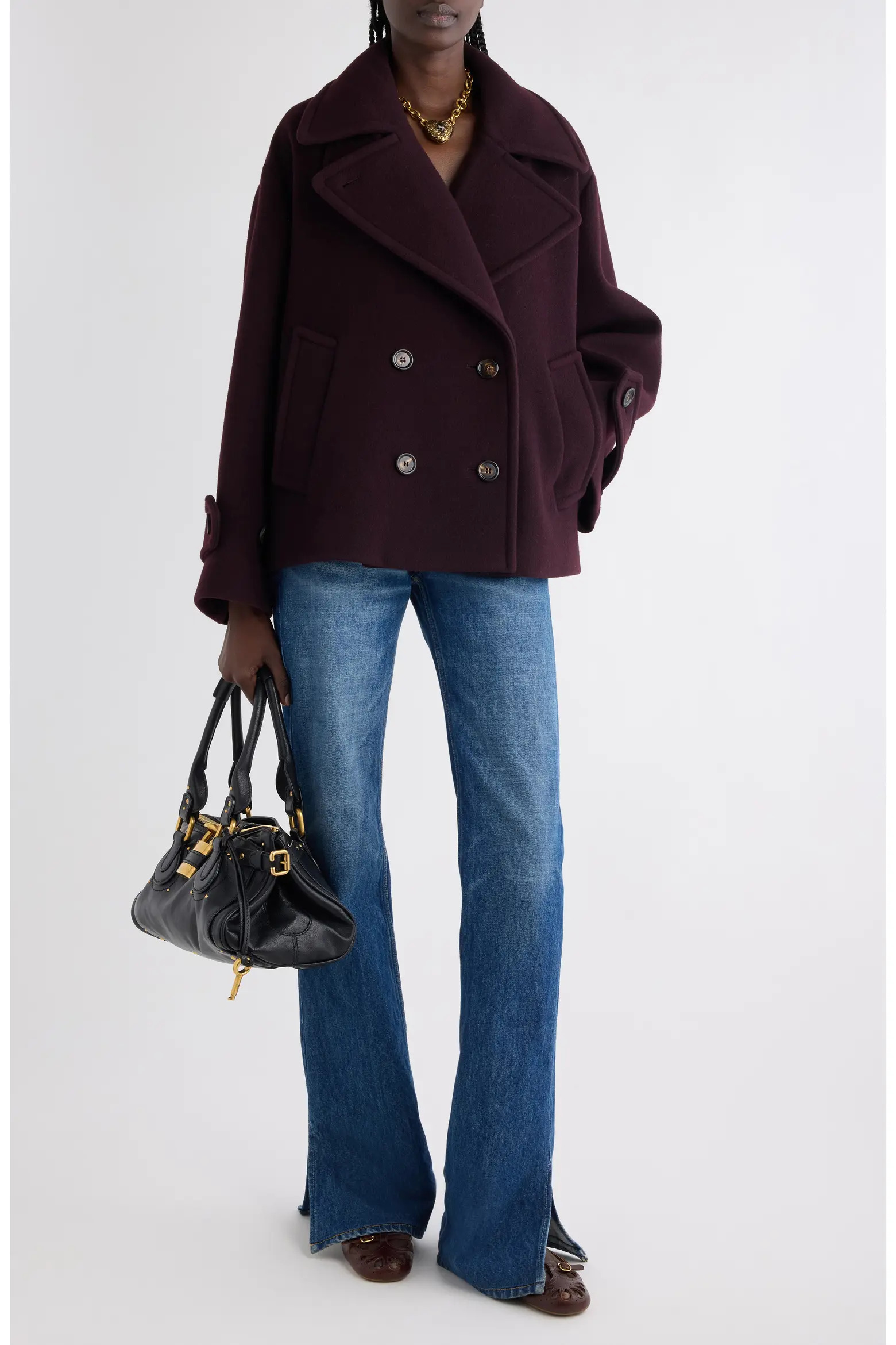 Chloé Iconic Soft Wool Blend Coat in deep purple worn over black trousers