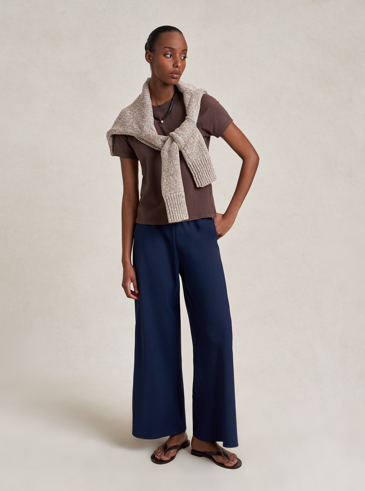 Model wearing the navy La Ligne Cropped Colby Pant