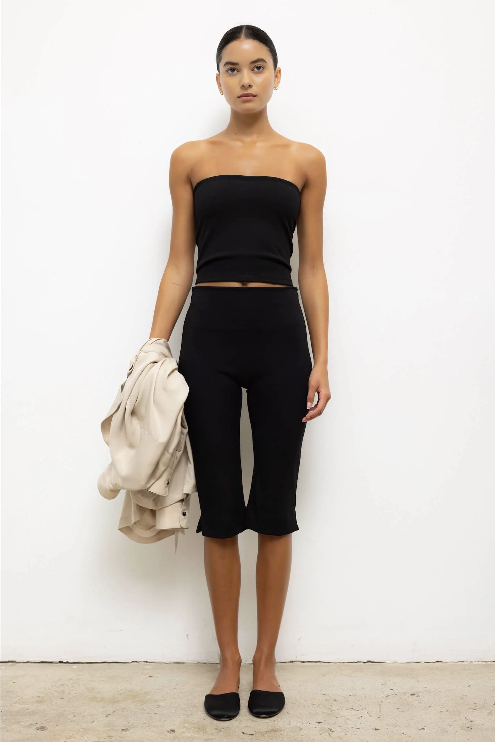 Model wearing the black LESET Rio Capri