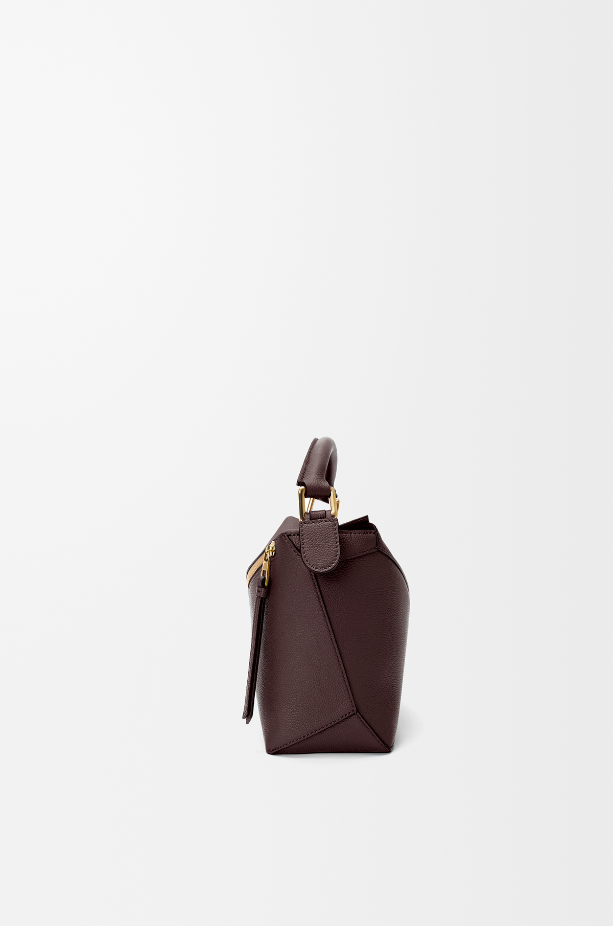 Side view of Loewe Small Puzzle Edge bag showing folded cuboid shape