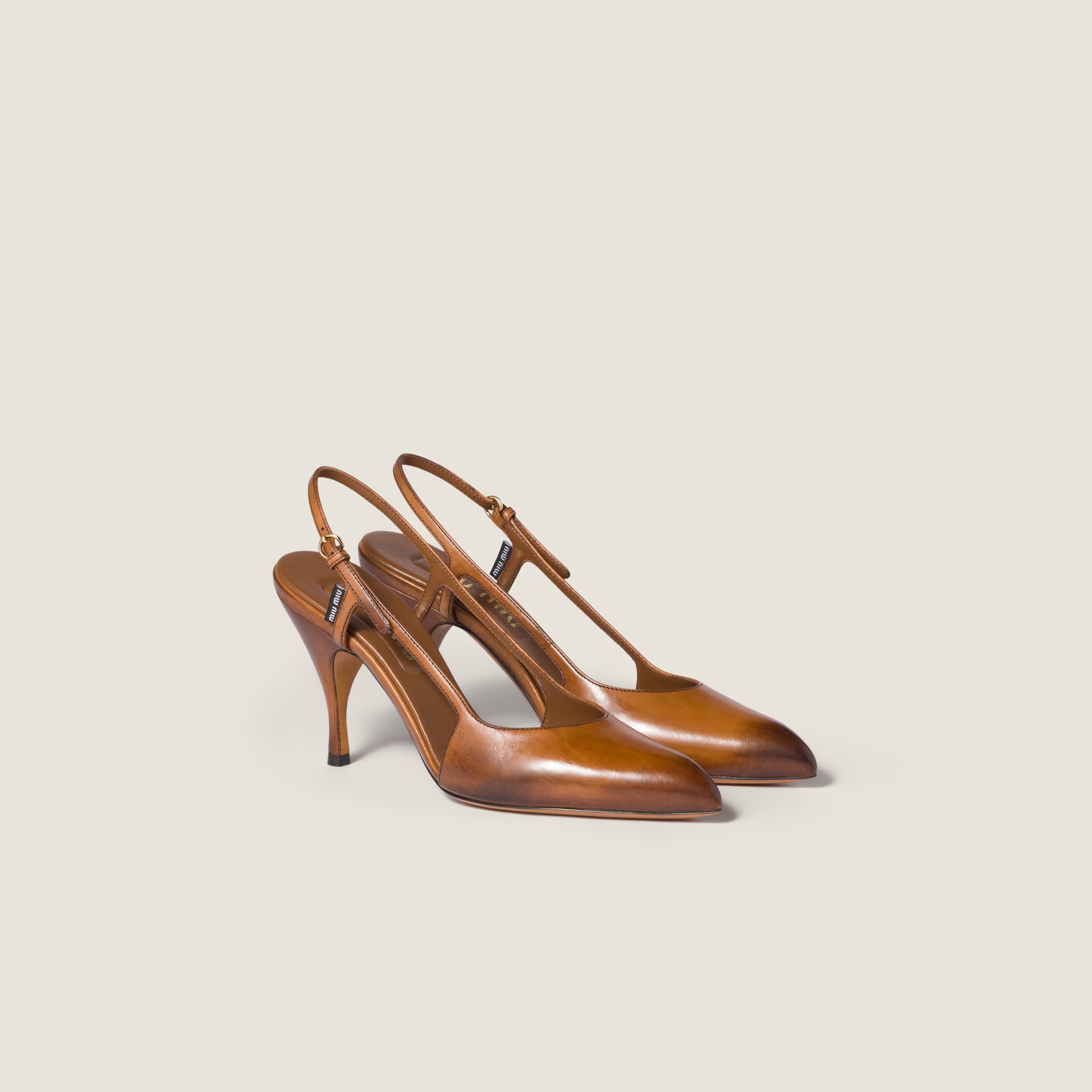 Miu Miu Leather slingback pumps in brown calfskin with 85 mm heel and pointed toe
