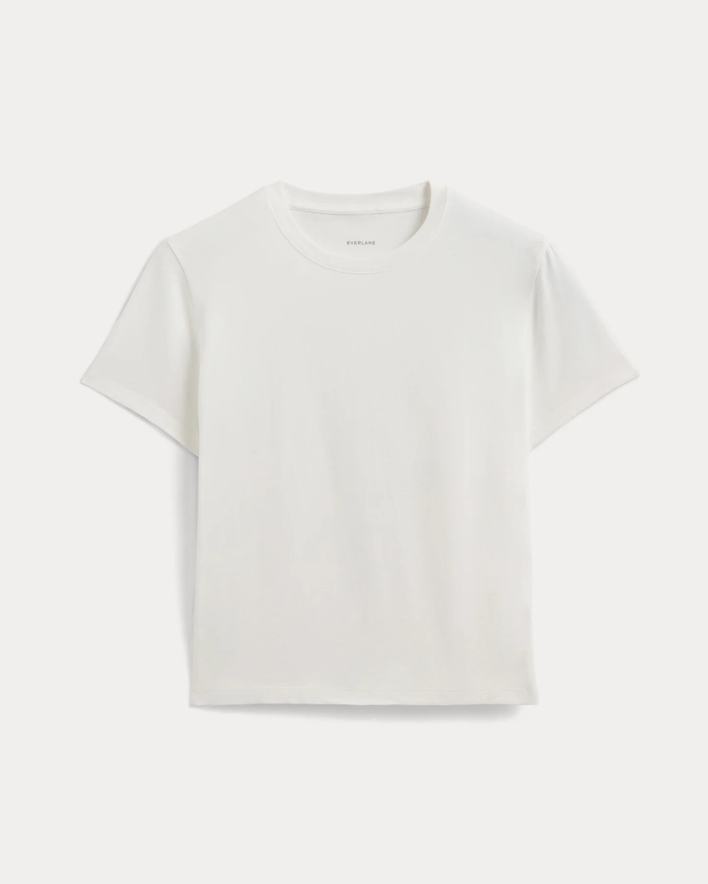 Everlane Box-Cut Tee in White shown flat against a light background