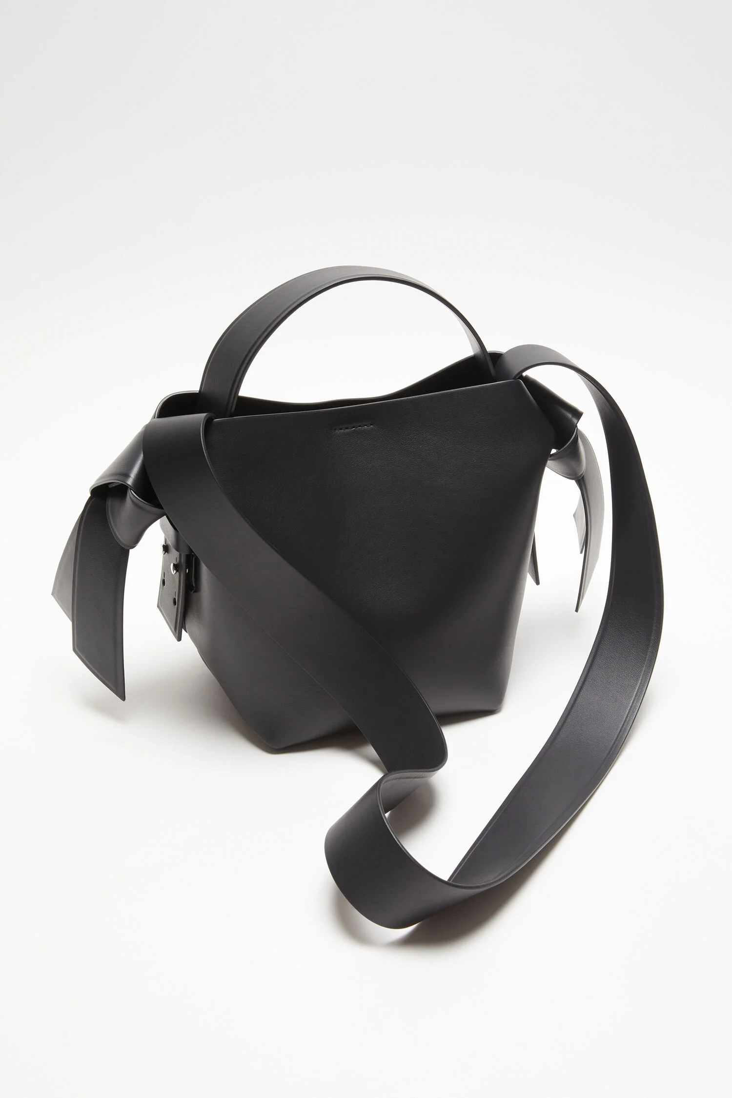 Black Acne Studios Musubi Mini R bag shown at an angle
