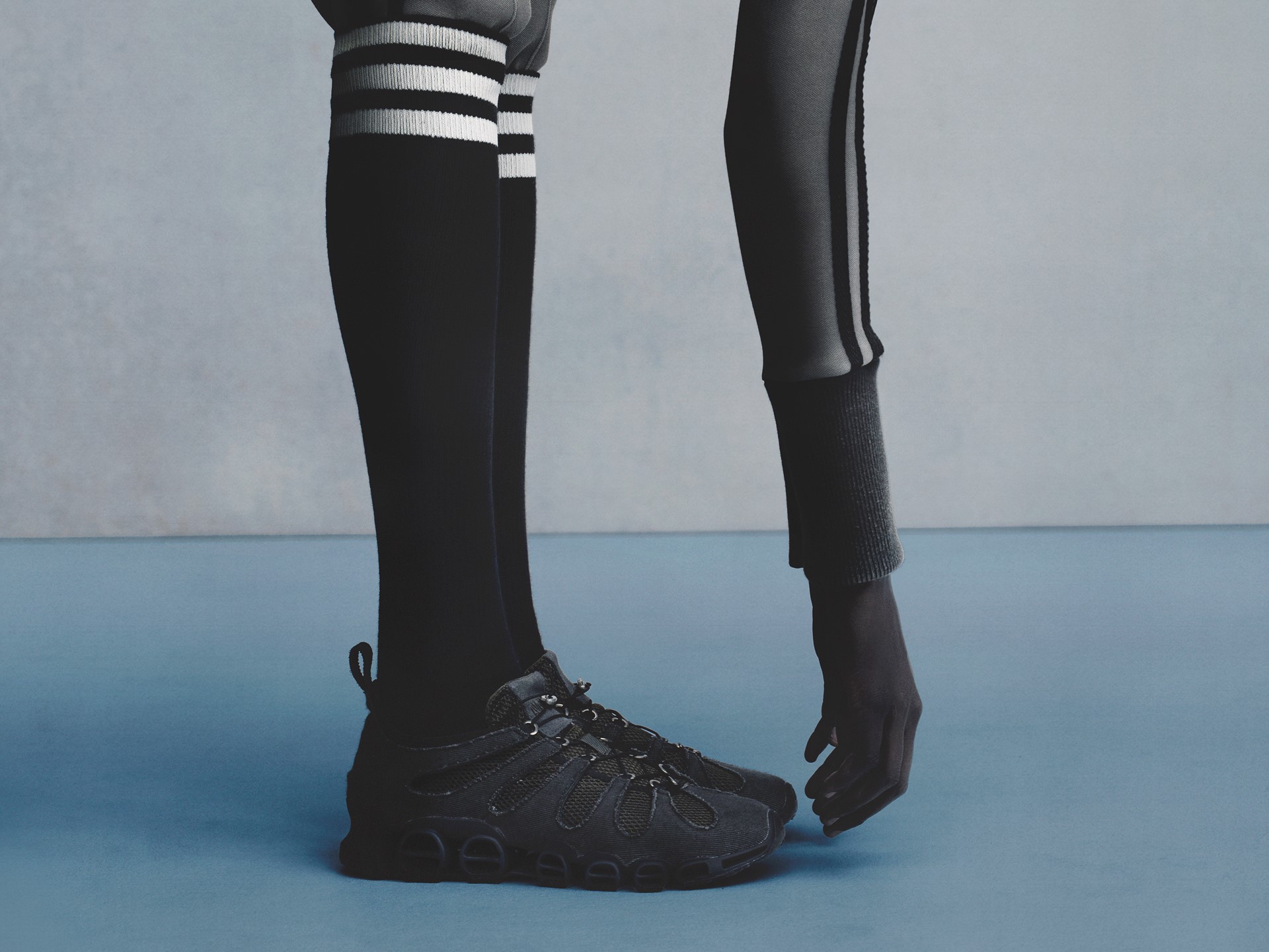Black Adidas Megaride by AVAVAV with cut-out caging